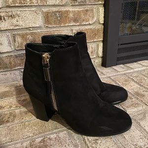 Black ankle booties with gold detail